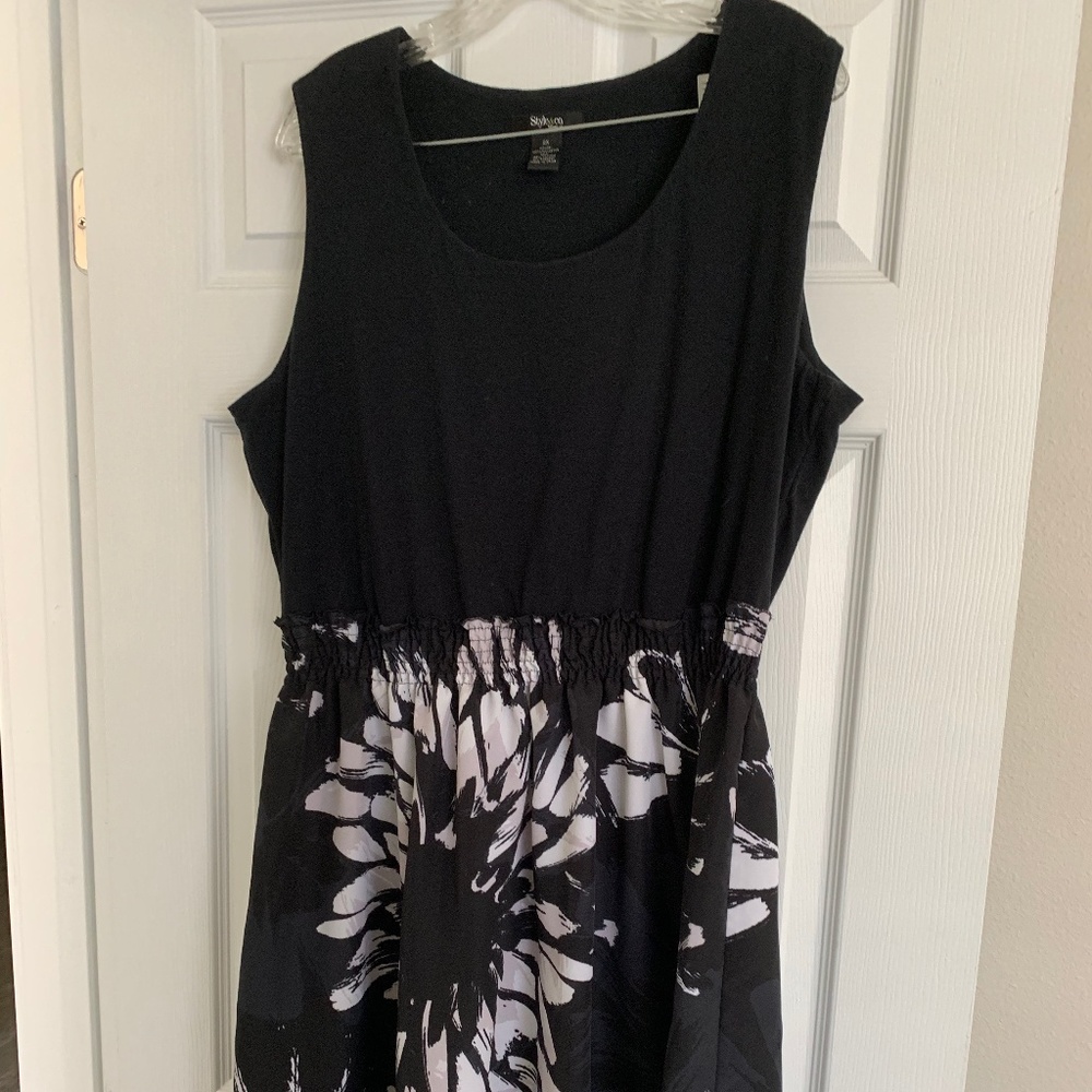 Sleeveless black and floral cinch waist dress